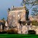 A 14th century medieval castle with lush lawn